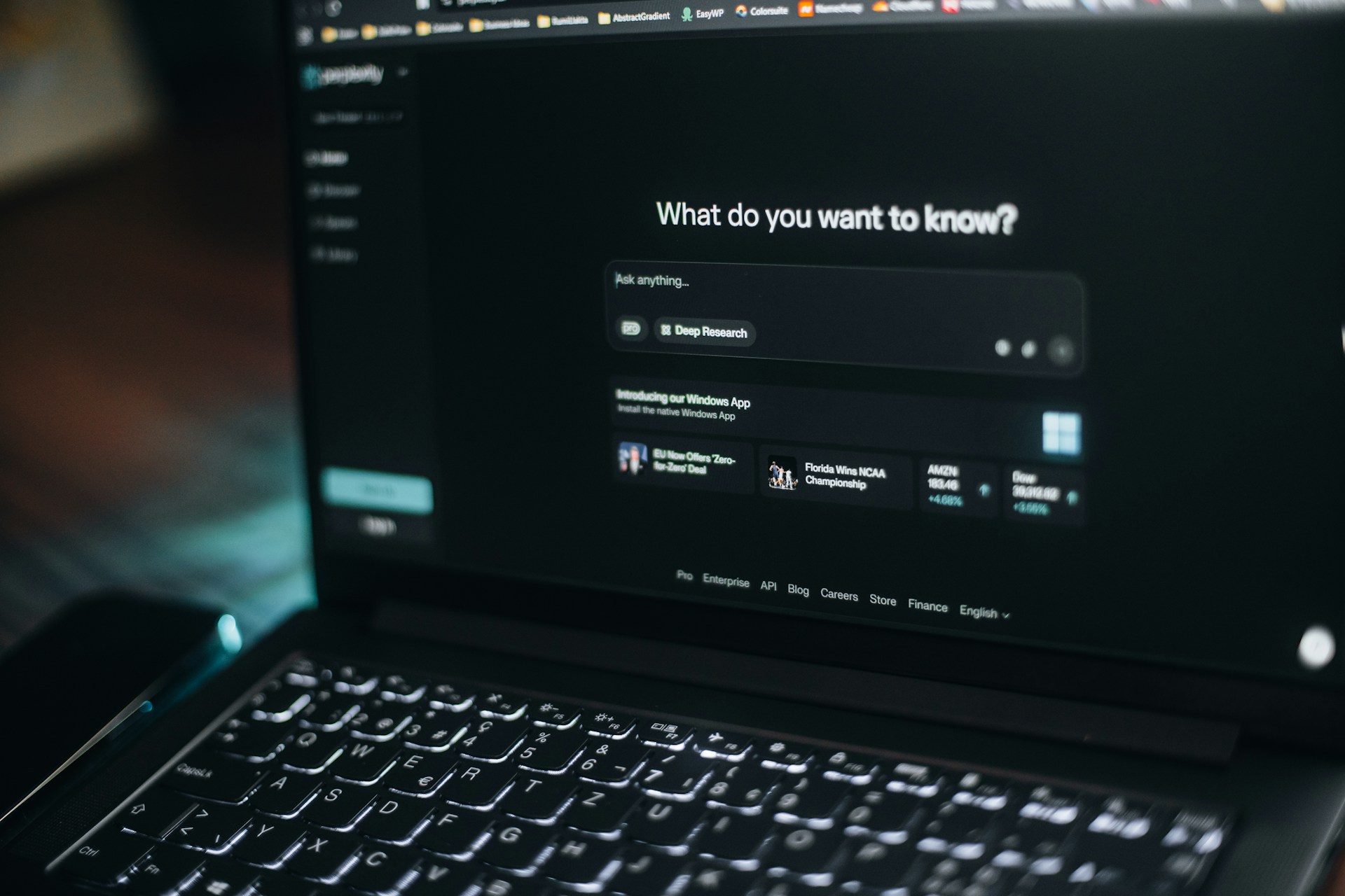 An open laptop, showing the web interface of OpenAI's ChatGPT ready to receive a prompt.